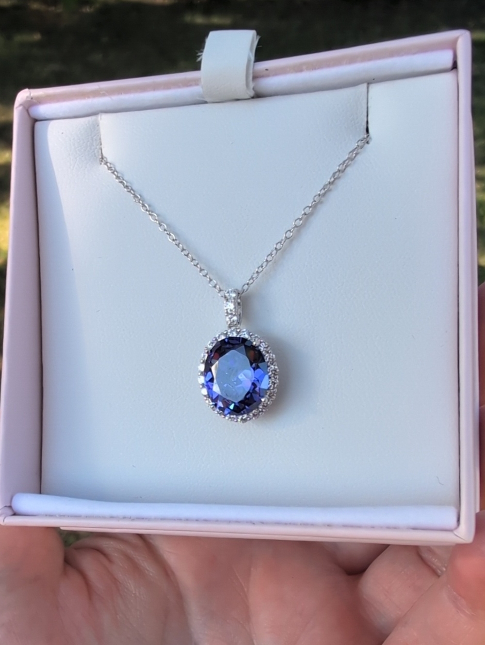 Vanna K Sterling Silver Necklace with Deep Blue Oval Halo Pendant